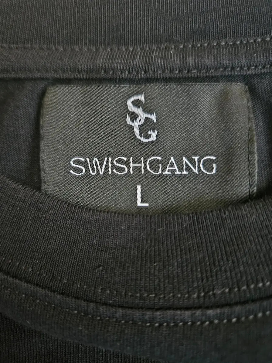 SwishGang woven brand tag detail on "Success is a Decision" black t-shirt neckline – SwishGang