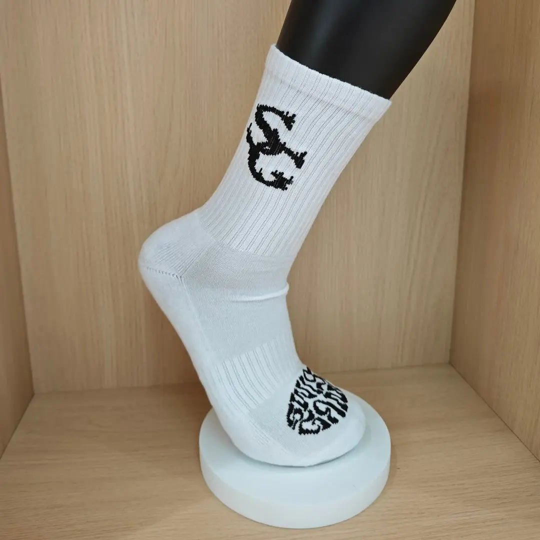 SwishGang white crew socks with black SG logo on mannequin side angle showing SwishGang sole detail